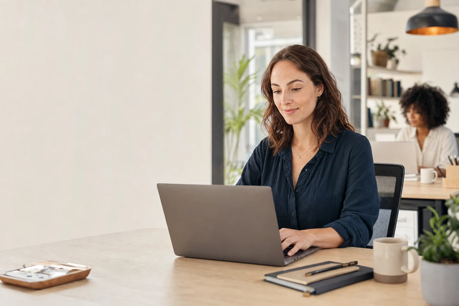 A customer support professional working calmly while Fyne AI handles repeatable requests