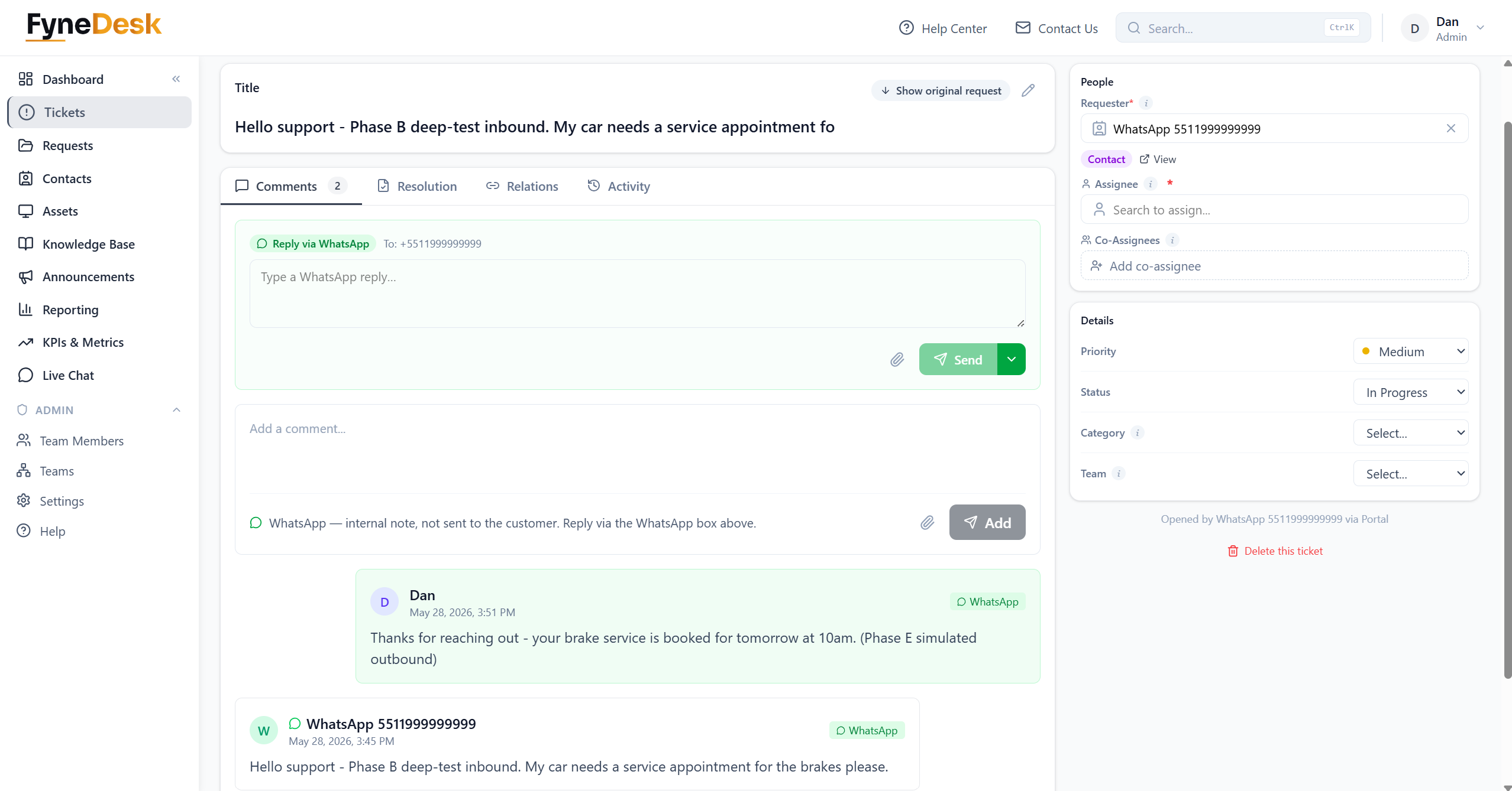 A FyneDesk ticket created from an inbound WhatsApp message — the customer's message appears in the conversation, with a Reply via WhatsApp box above it and an agent's reply threaded below